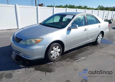 2002 Toyota Camry Le z USA, uszkodzony, nr VIN 4T1BE32K22U576903